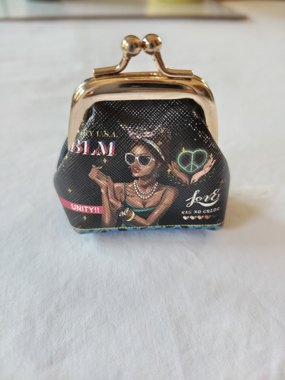 Black Kiss-Lock Coin Purse with Gold Frame and Graphic Print